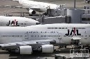 American Airlines a Delta bojuj o Japan Airlines